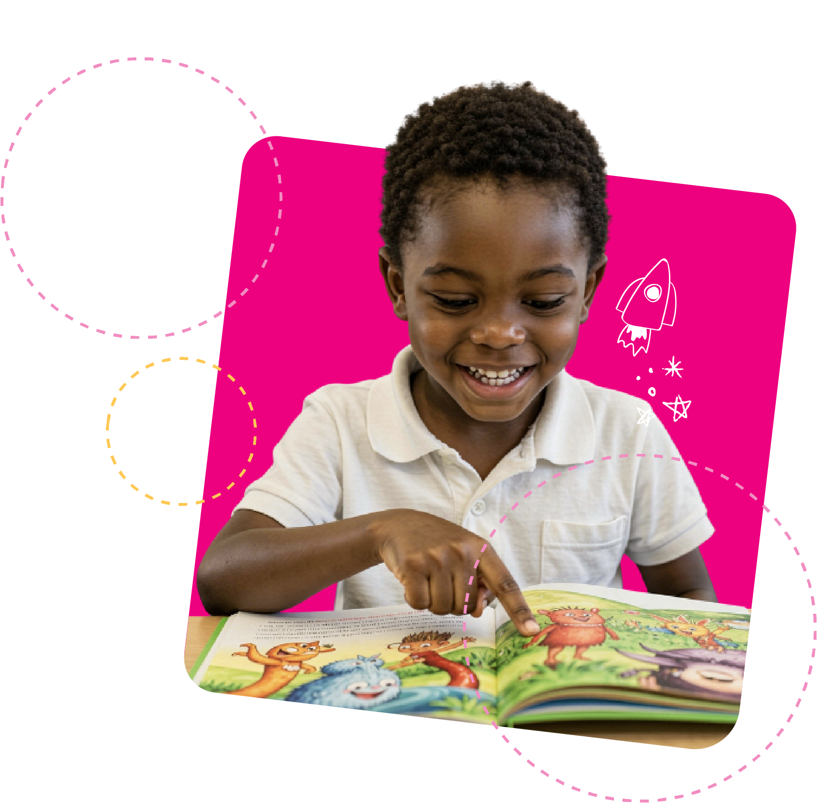 Smiling 1st grade boy points at page in book he is reading