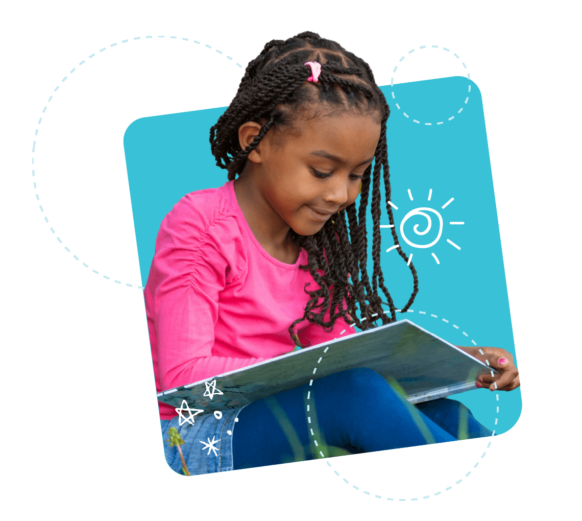 A 1st grade student laughing while holding a large book open in front of their face, surrounded by a blue background and illustrated circle graphics A 1st grade student laughing while holding a large book open in front of their face, surrounded by a blue background and illustrated circle graphics